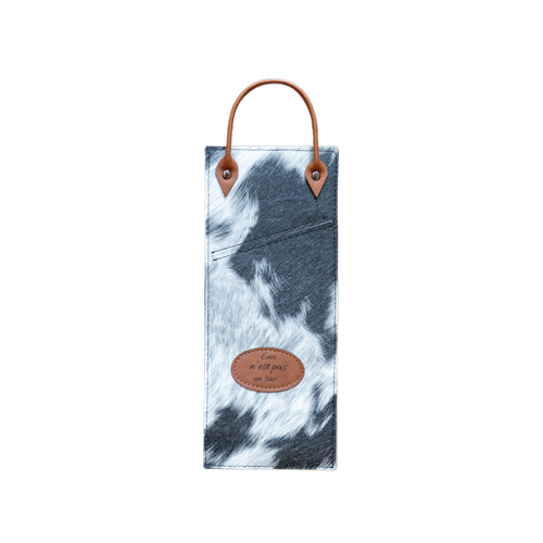 Pochette peau de vache blanche et noir avec anse brune